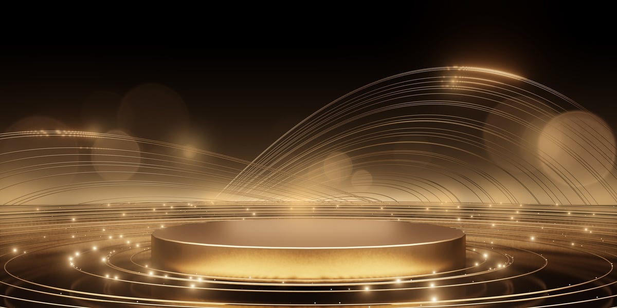 Luxurious golden podium with glowing circular light representing strategic excellence
