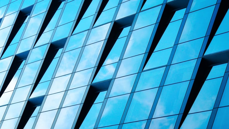 Modern building reflections representing strategic scenarios