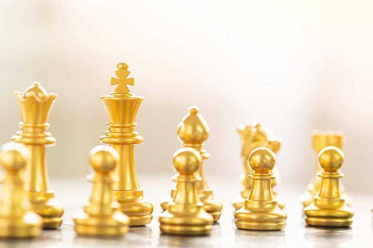 Golden chess pieces representing strategic problem solving